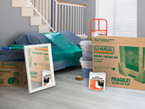Boxes & Moving Supplies on the floor of a living room