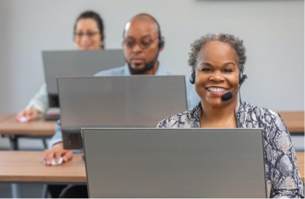 Relocation experts at their computers