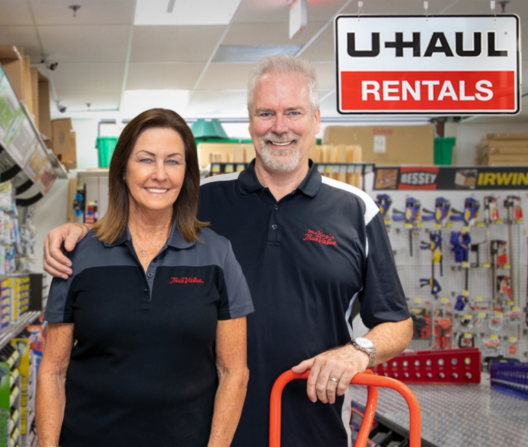 A couple inside of a U-Haul store
