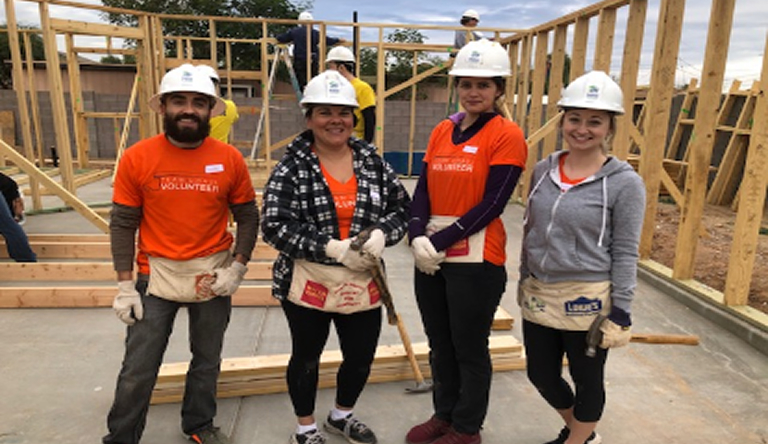 U-Haul employee volunteers assisting with disaster relief construction