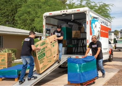 Moving Helpers loading household goods into a truck