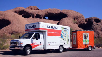 U-Haul truck parked with a U-Haul trailer