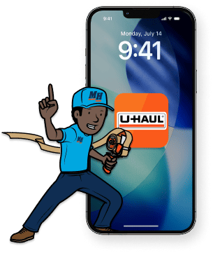Image of a phone displaying the U-Haul App and a Moving Helper caricature standing next to the phone