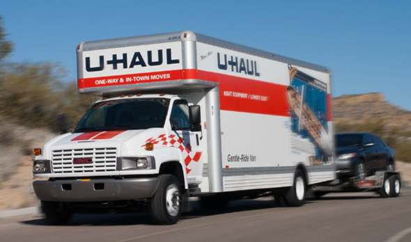 U-Haul truck with car dolly