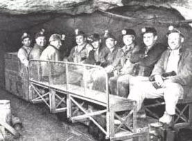A mine car full of miners