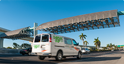 U-Haul cargo van driving on the highway